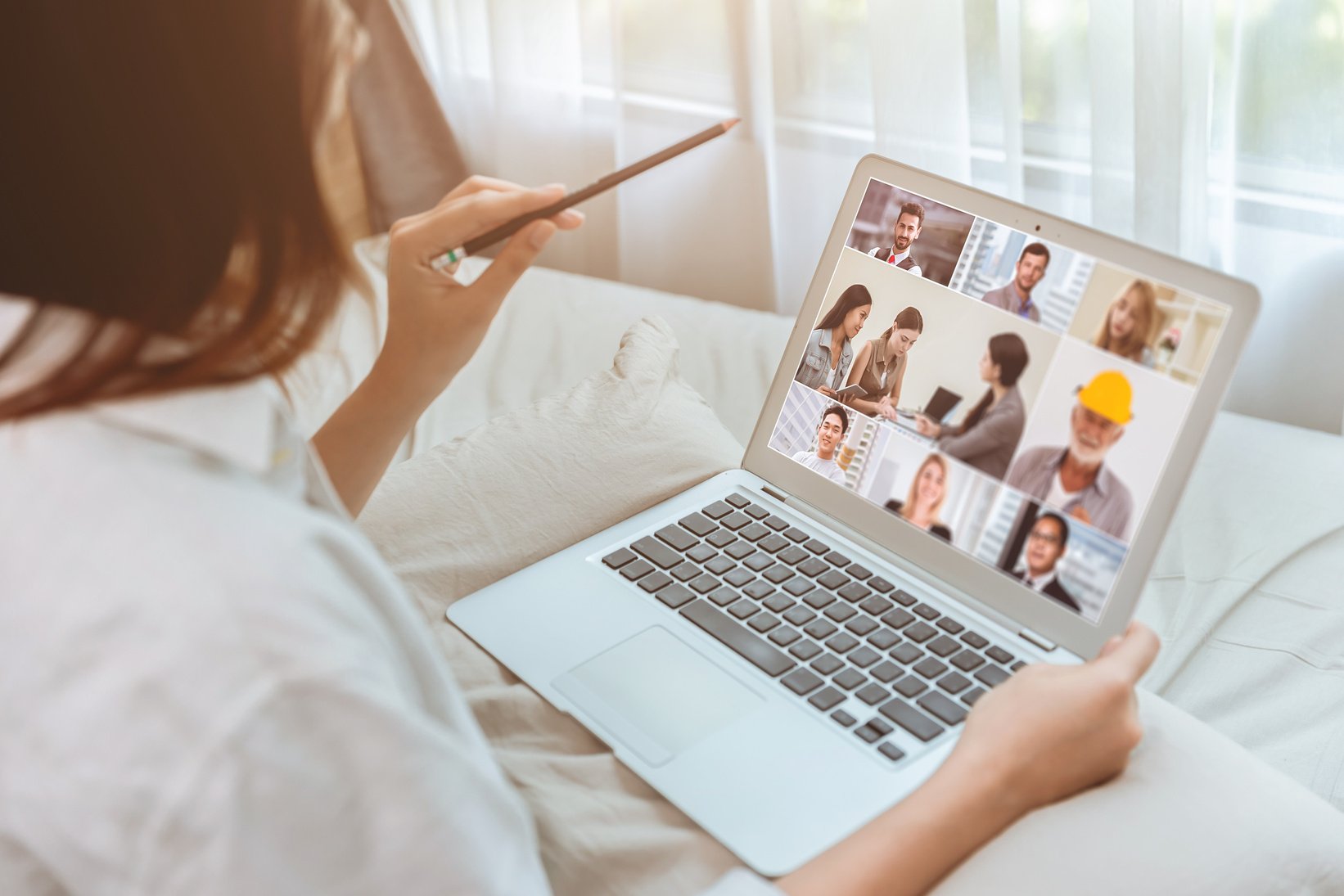 Business women stay home closeup zoom meeting video call with business parter with laptop during self quarantine.