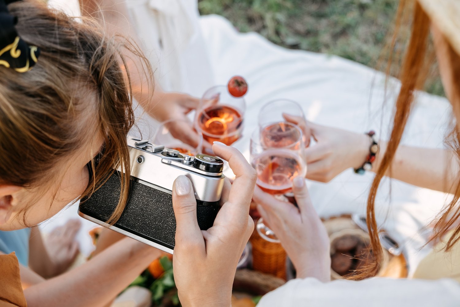 Female Lifestyle Blogger Taking Food and Wine Photo